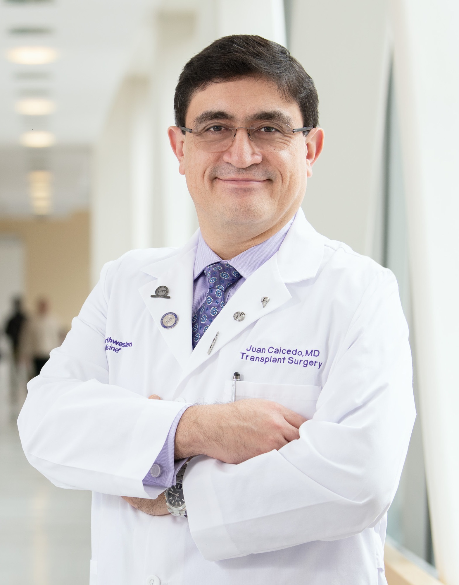 Juan C. Caicedo, MD